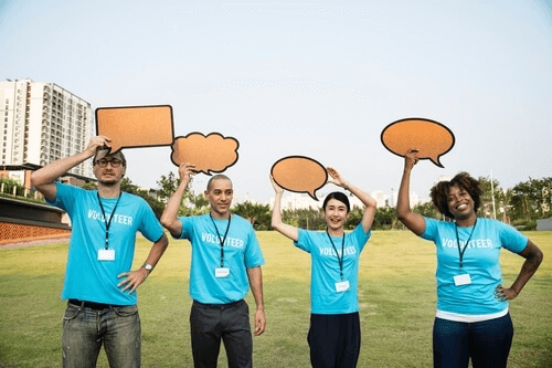 image of people holding thought bubbles