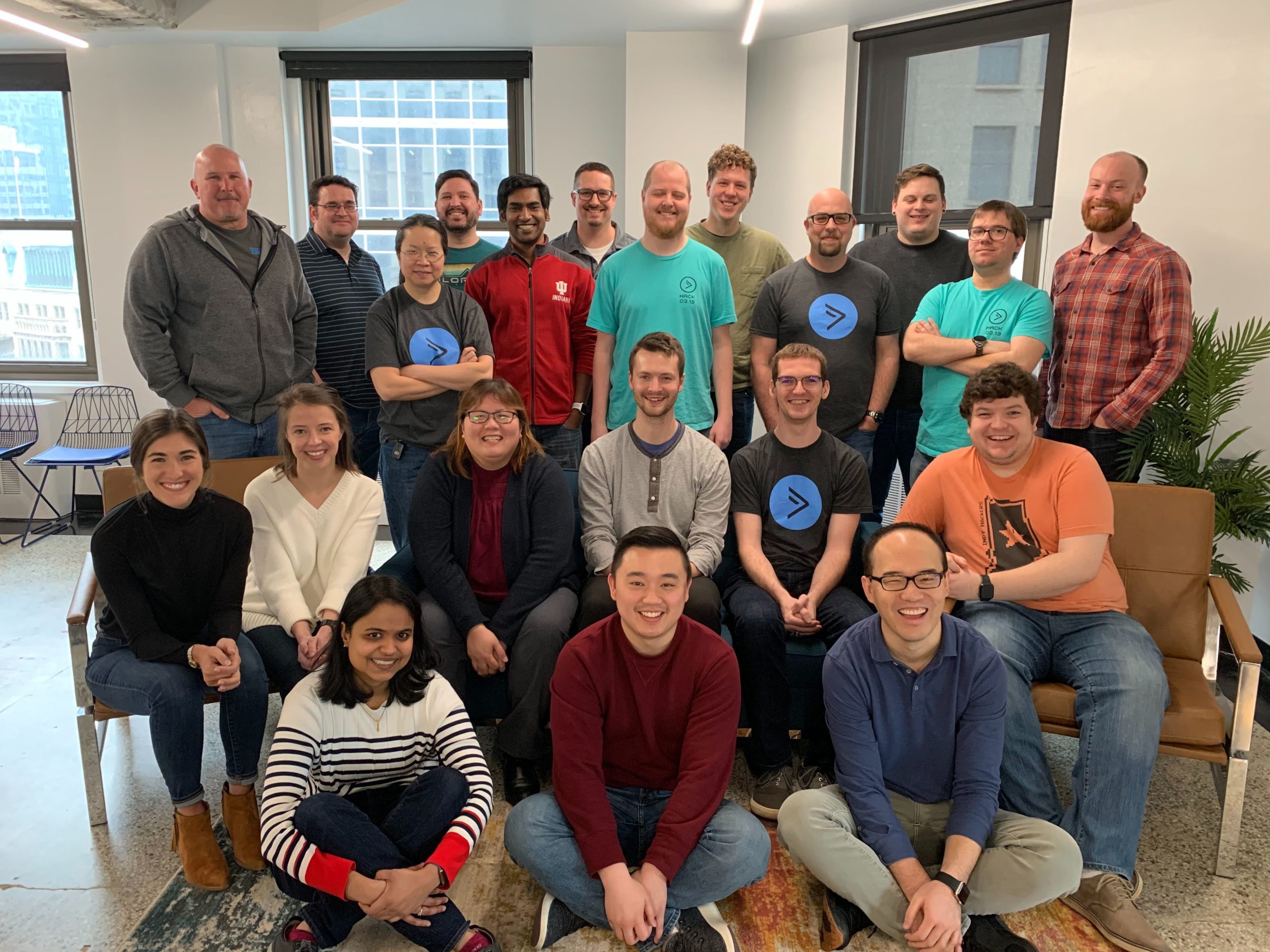 The Indianapolis team posing for an office group photo