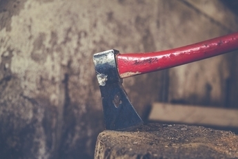 a sharp axe representing the famous Abraham Lincoln quote “Give me six hours to chop down a tree and I will spend the first four sharpening the axe.”